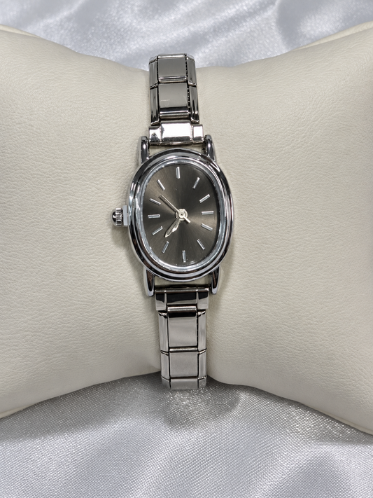 Reloj Ovalado